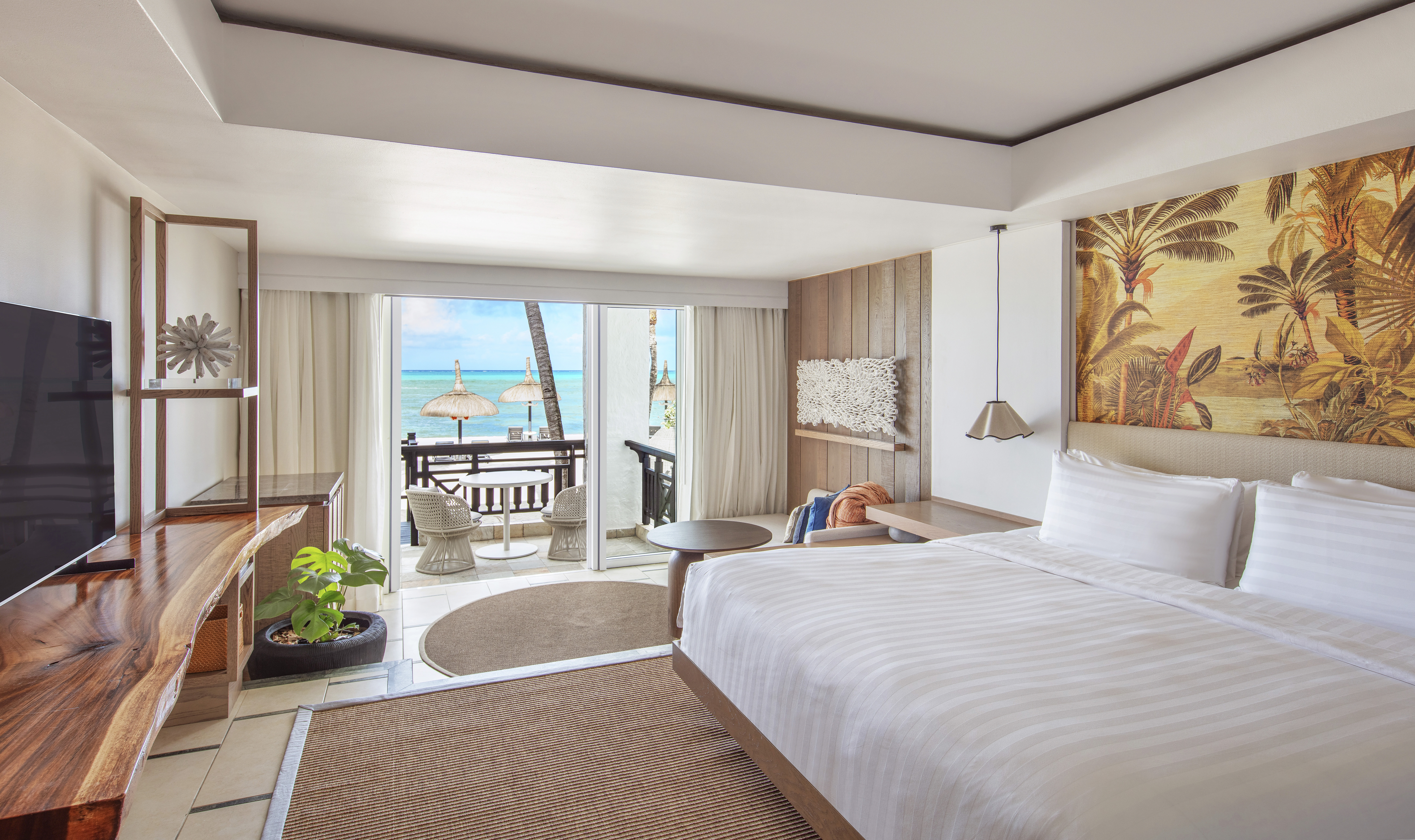 Ocean view bedroom in a luxury hotel.