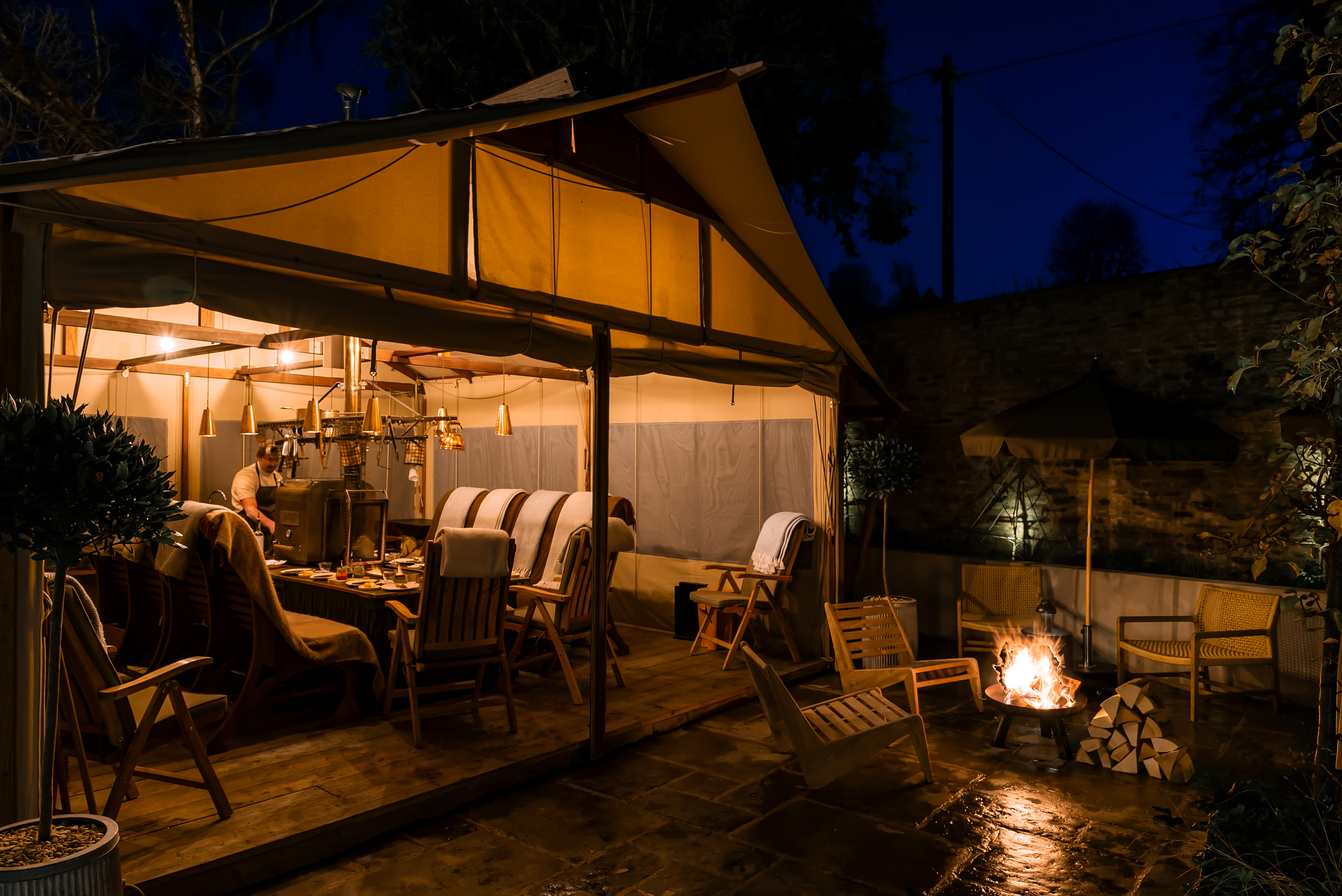 Wild dining concept with its marquee setting and open-fire cooking