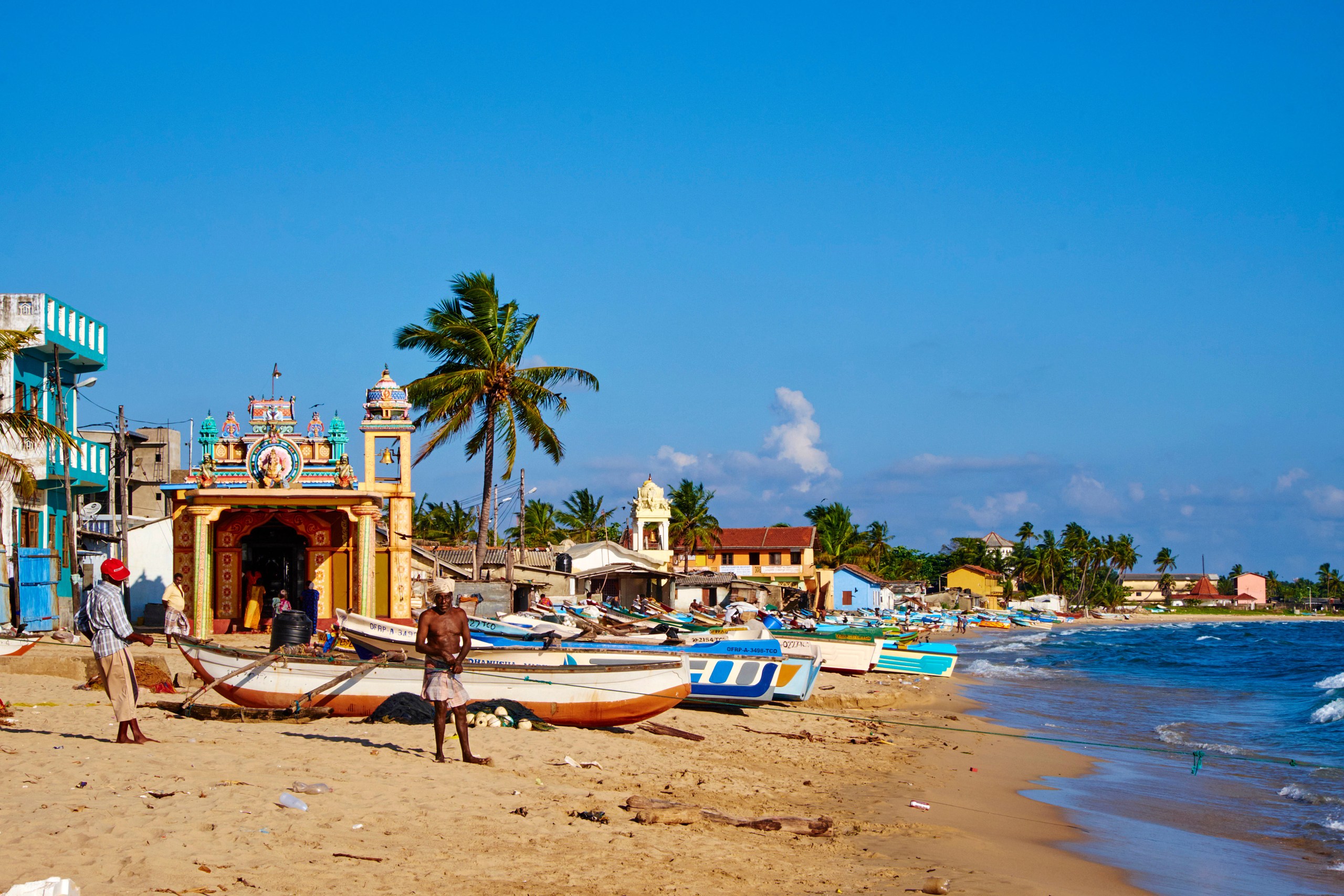 Fishermen and their boats at Trincomalee on the east coast of Sri Lanka
