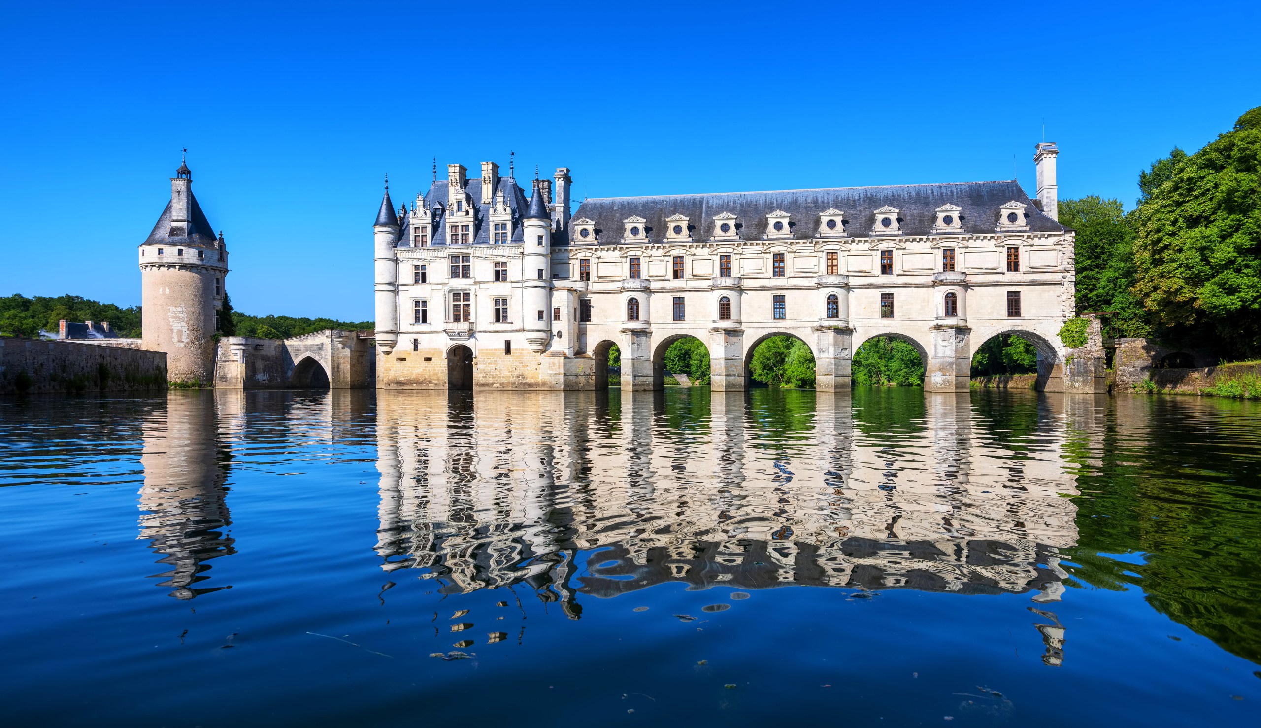 Chateau de Chenonceau in France's picturesque Loire Valley, an essential July destination.